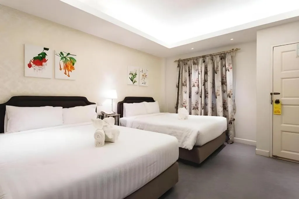Bed in Verona Boutique Hotel - The Verona Co., Ltd