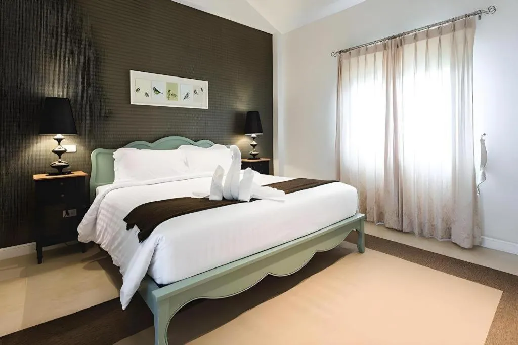Bed in Verona Boutique Hotel - The Verona Co., Ltd