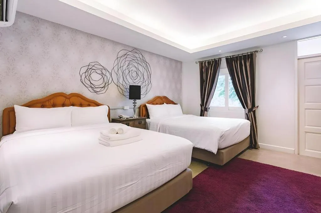 Bed in Verona Boutique Hotel - The Verona Co., Ltd