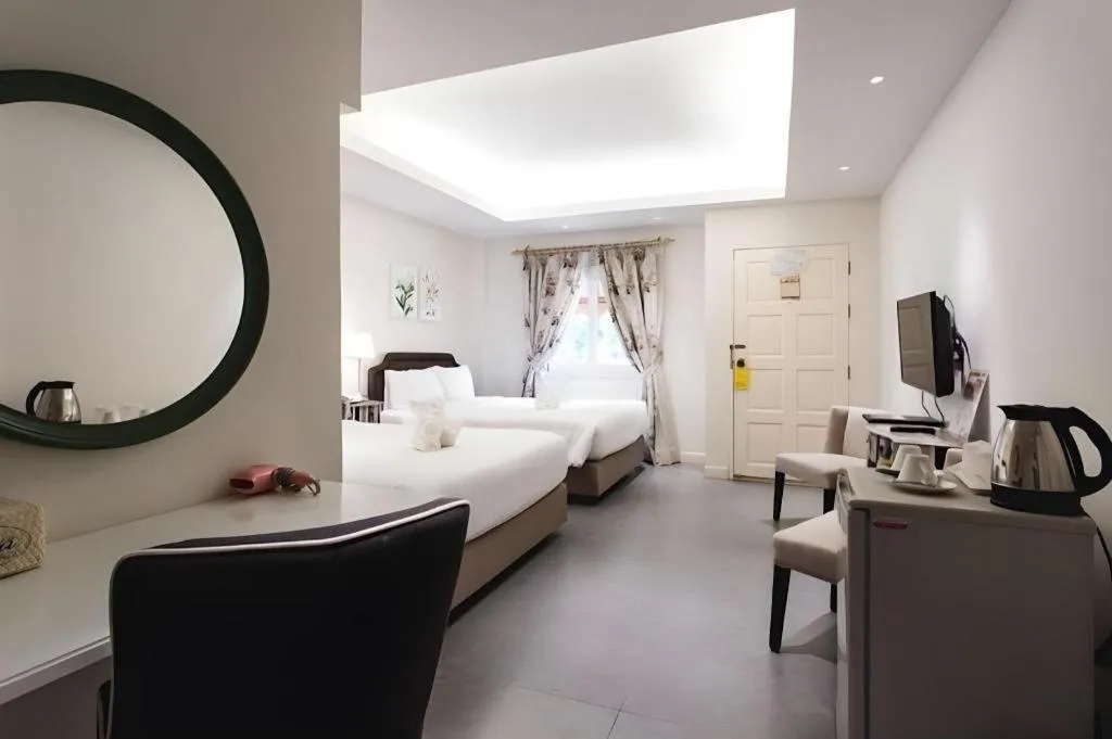 Bed in Verona Boutique Hotel - The Verona Co., Ltd