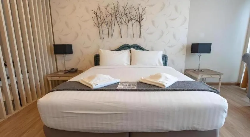 Bed in Verona Boutique Hotel - The Verona Co., Ltd
