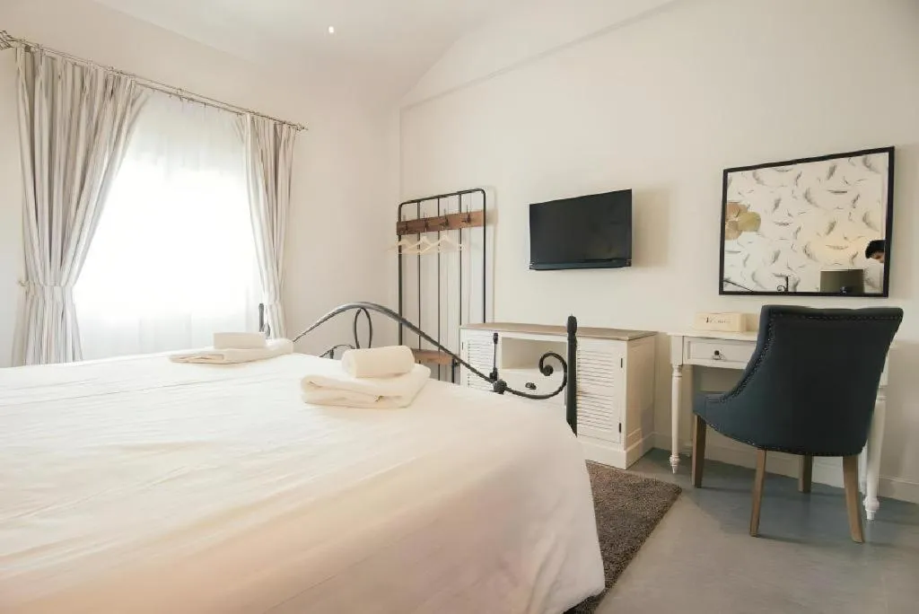 Bed in Verona Boutique Hotel - The Verona Co., Ltd