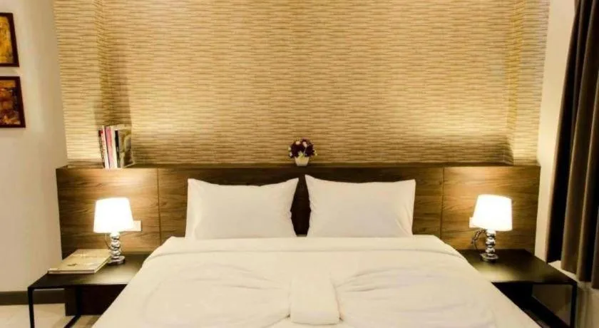 Bed in Seree Grand Resort