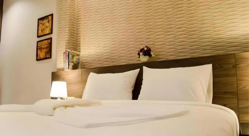 Bed in Seree Grand Resort