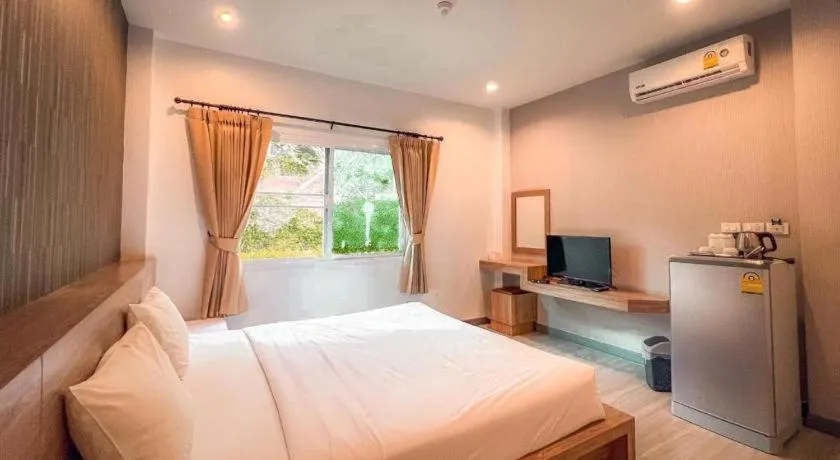 Bed in Seree Grand Resort