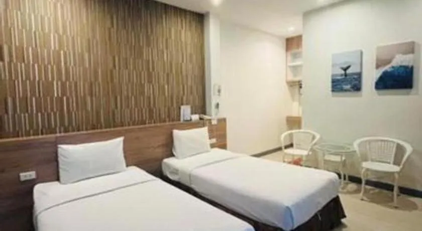 Bed in Seree Grand Resort