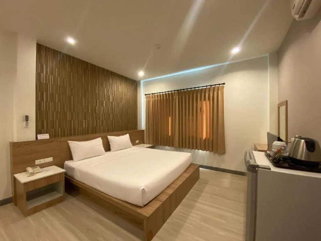 Bed in Seree Grand Resort