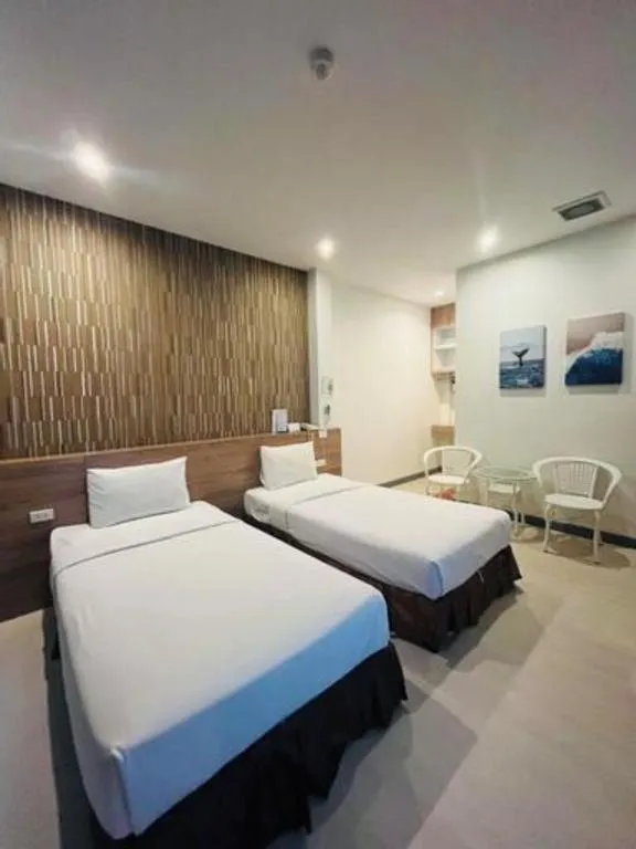 Bed in Seree Grand Resort