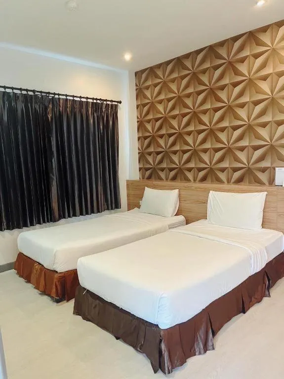 Bed in Seree Grand Resort