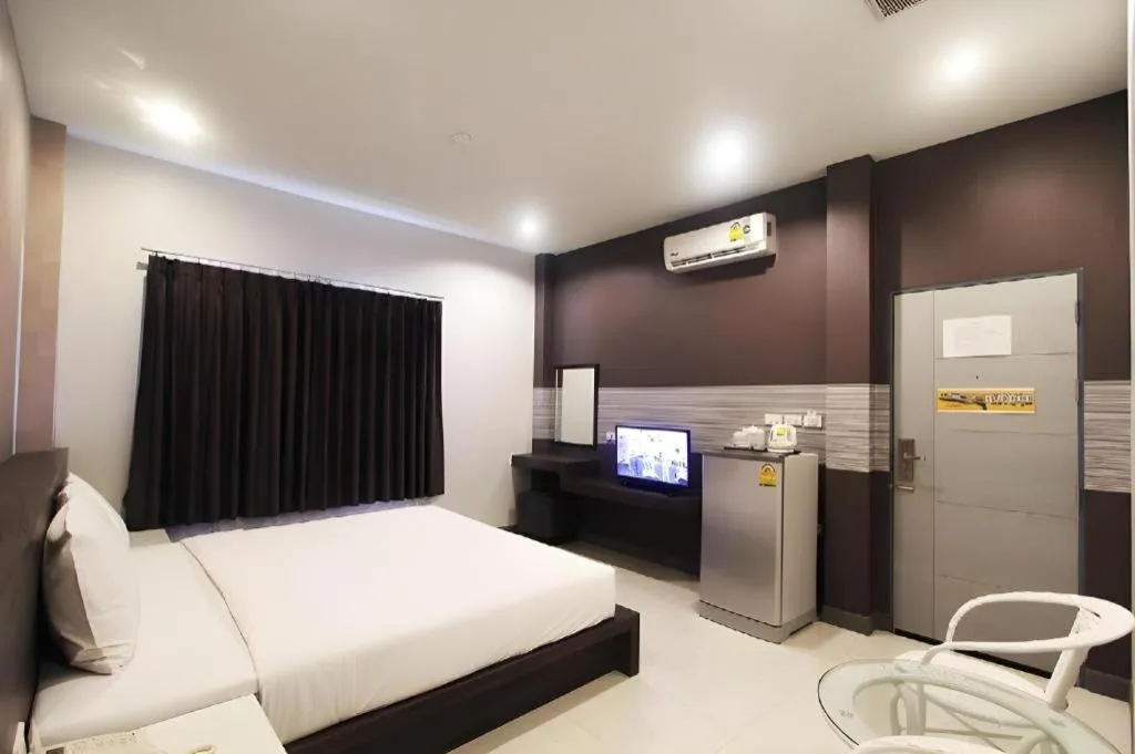 Bed in Seree Grand Resort