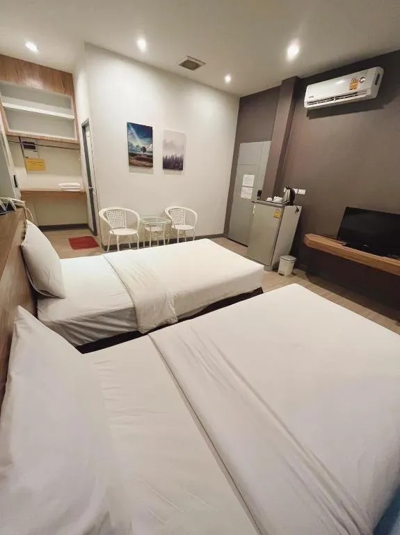 Bed in Seree Grand Resort