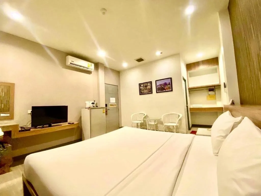 Bed in Seree Grand Resort