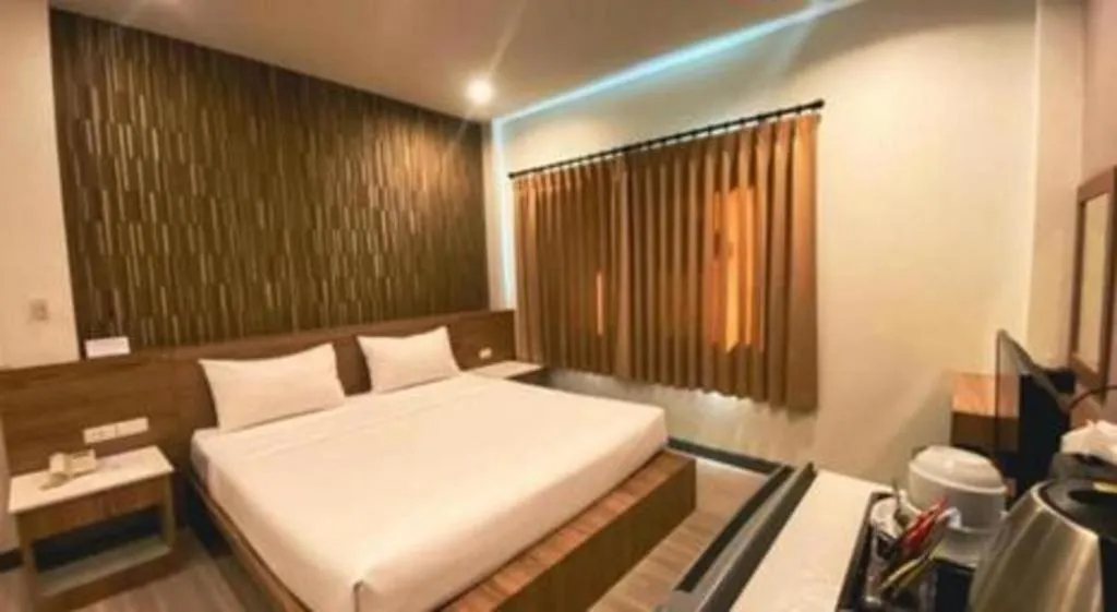 Bed in Seree Grand Resort