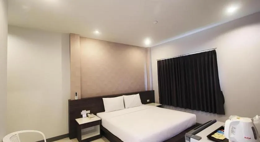 Bed in Seree Grand Resort