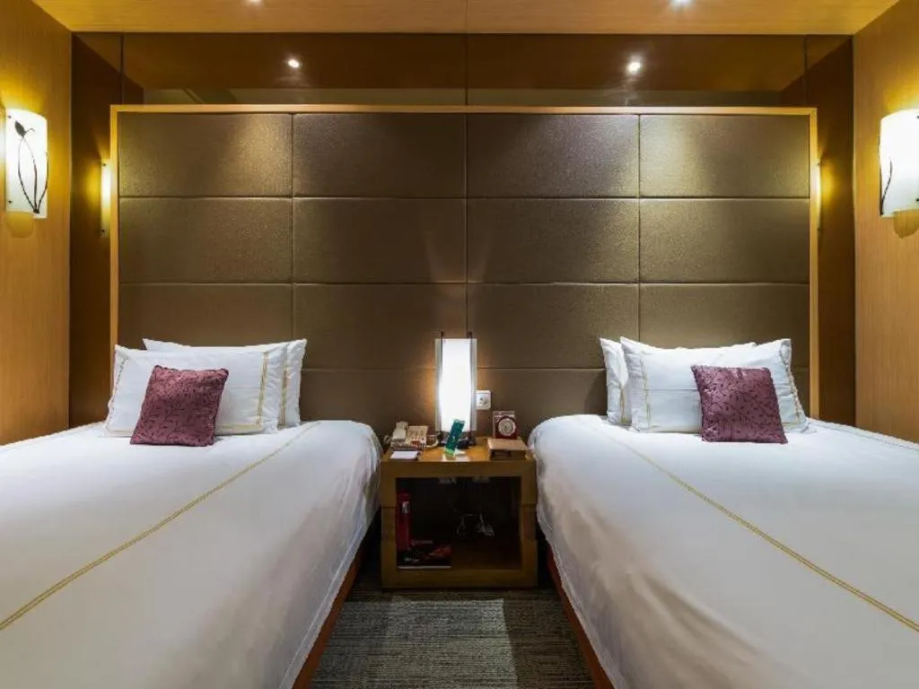 Bed in Huana Hotel Minhang Shanghai