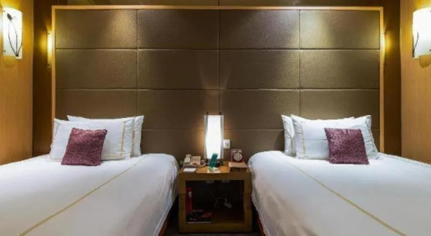Bed in Huana Hotel Minhang Shanghai