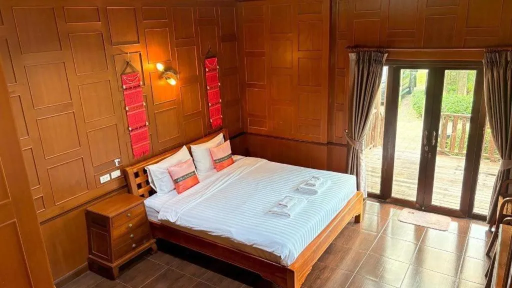 Bed in Baan Baitan Resort