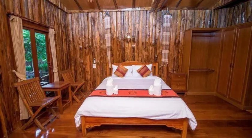 Bed in Baan Baitan Resort