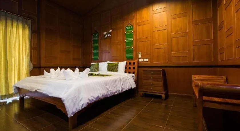 Bed in Baan Baitan Resort