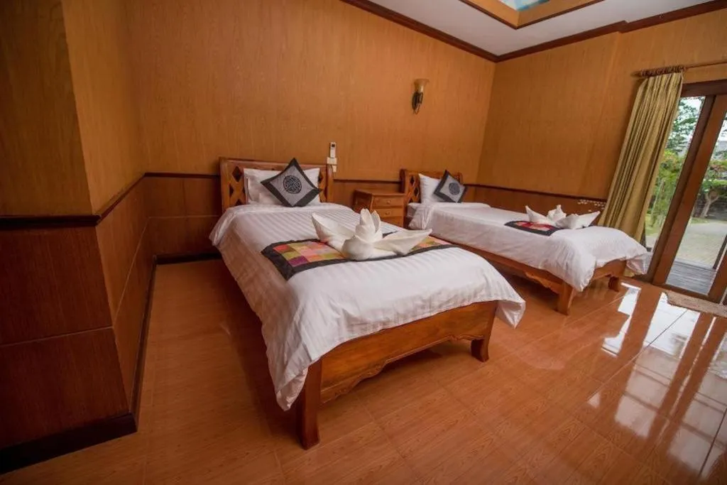 Bed in Baan Baitan Resort
