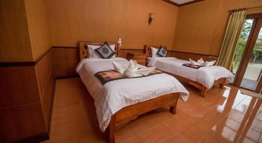 Bed in Baan Baitan Resort