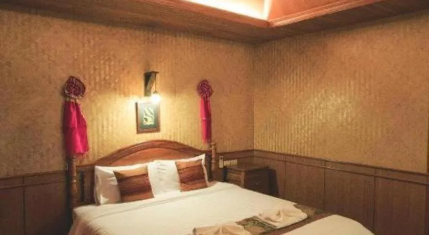 Bed in Baan Baitan Resort