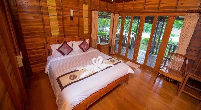 Bed in Baan Baitan Resort