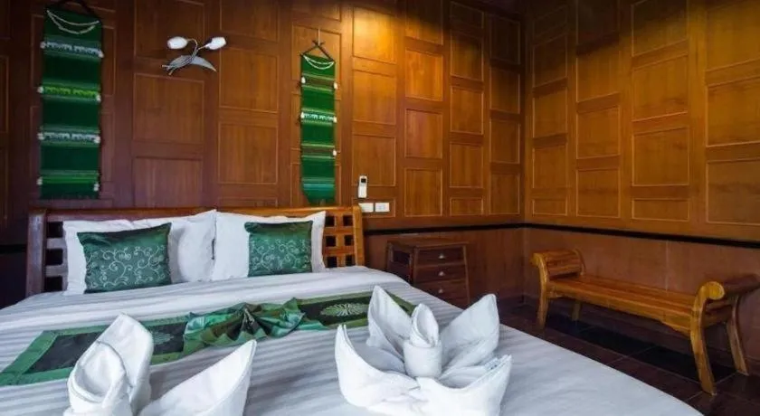 Bed in Baan Baitan Resort