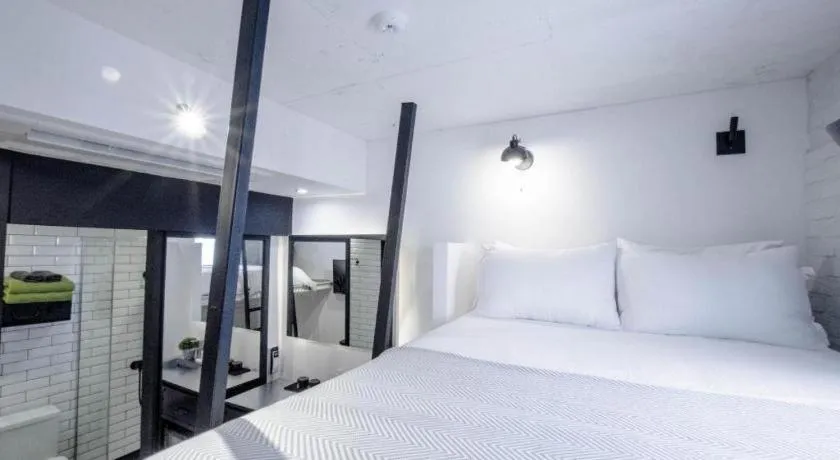 Bed in Mmmio II Design Residence Myeongdong