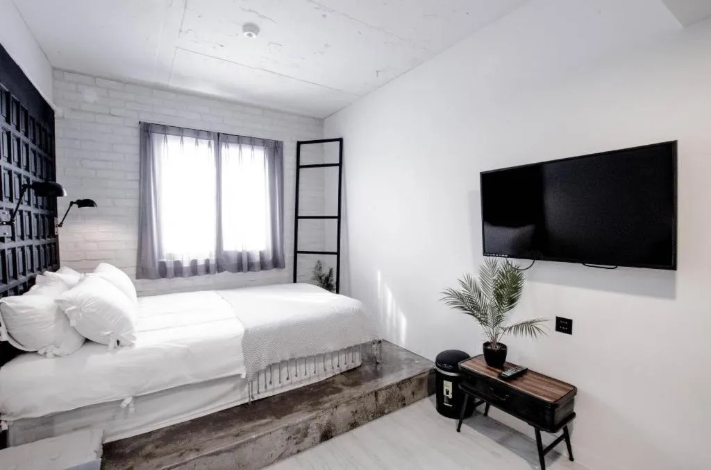 Bed in Mmmio II Design Residence Myeongdong