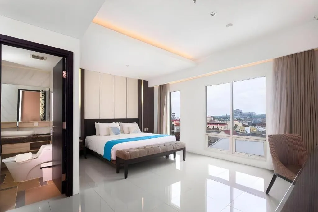 Bed in Java Lotus Hotel Jember