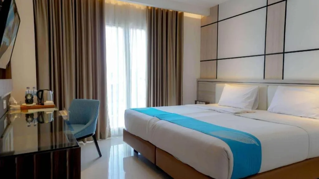 Bed in Java Lotus Hotel Jember