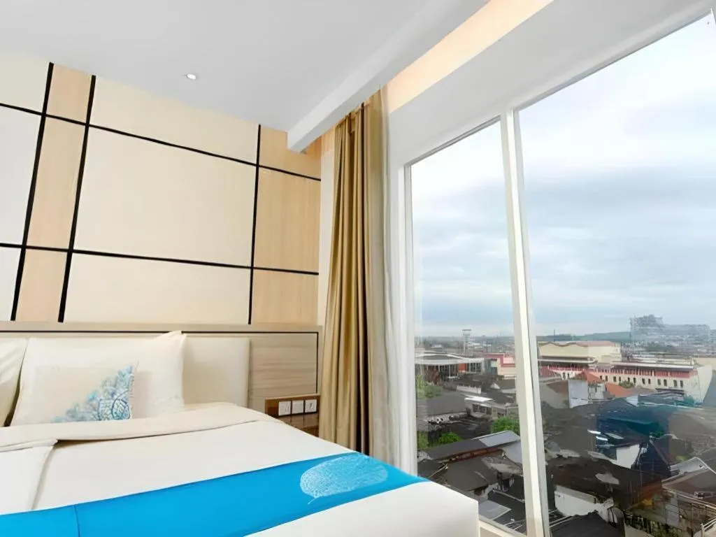 Bed in Java Lotus Hotel Jember