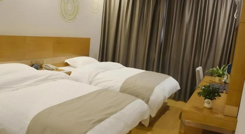 Bed in GreenTree Inn Anqing Wangjiang County Lantian Road Yiheyuan Express Hotel