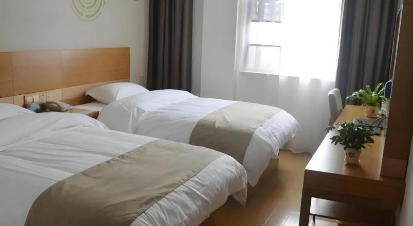 Bed in GreenTree Inn Anqing Wangjiang County Lantian Road Yiheyuan Express Hotel