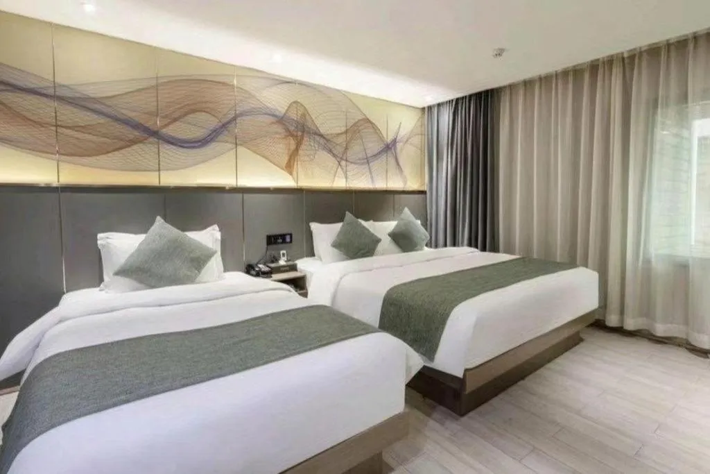 Bed in GreenTree Alliance Yichun Fengcheng Jianyi Avenue Hotel
