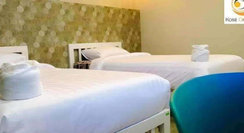 Bed in Kosit One Hotel