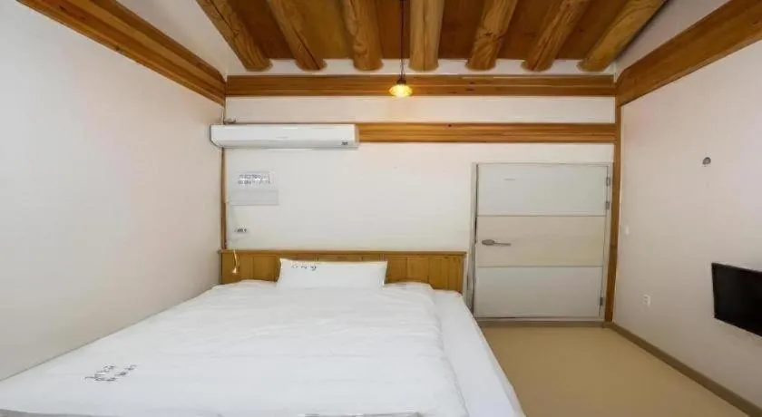 Bed in Nabijam Hanok Hotel