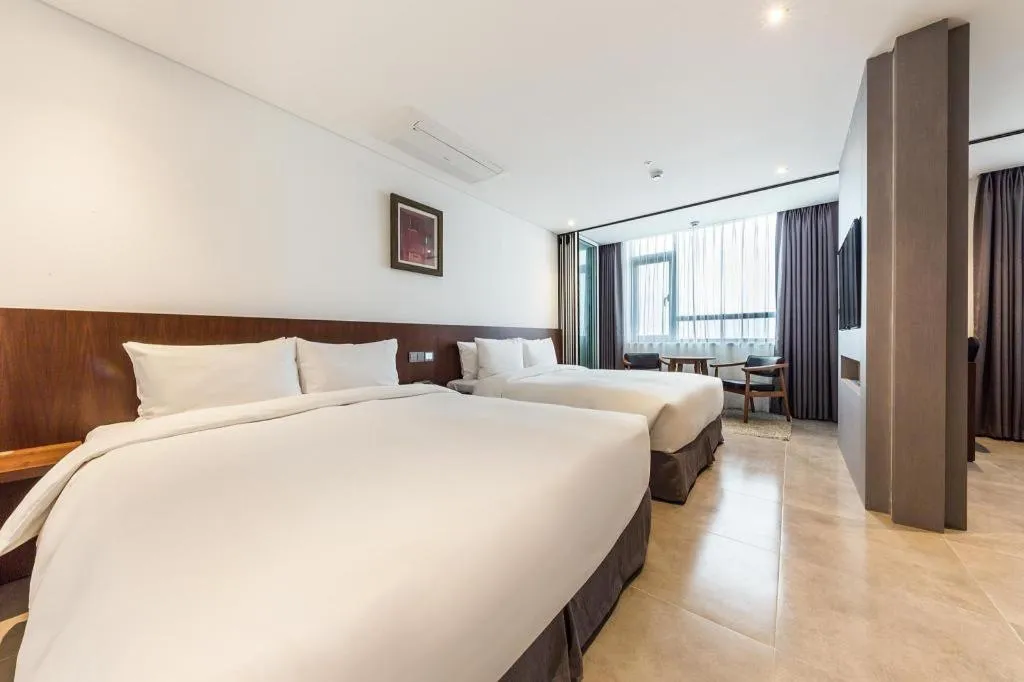 Bed in CS Premier Hotel