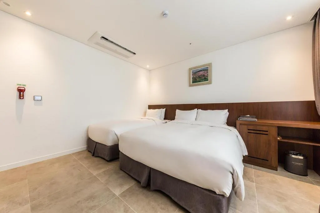 Bed in CS Premier Hotel