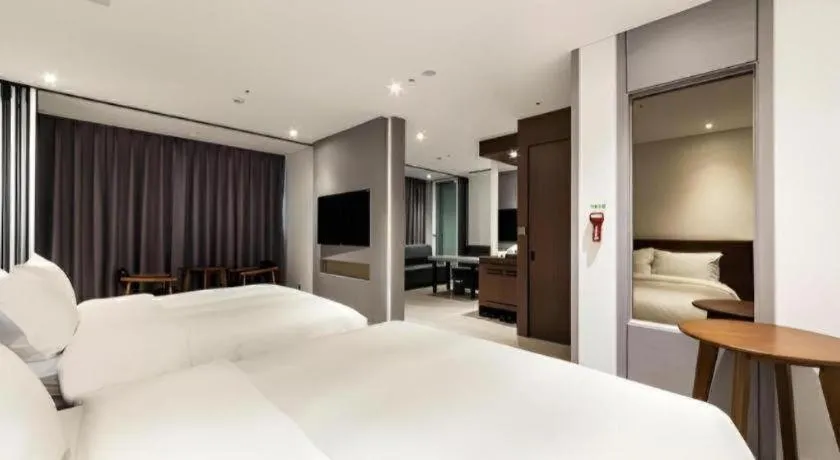 Bed in CS Premier Hotel