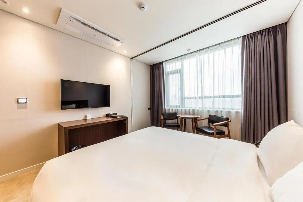 Bed in CS Premier Hotel