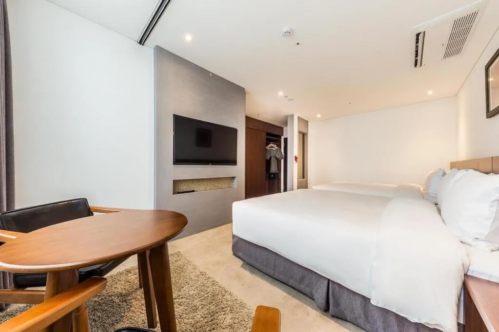 Bed in CS Premier Hotel