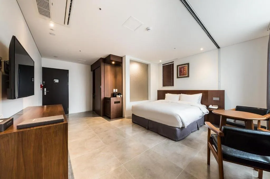 Bed in CS Premier Hotel