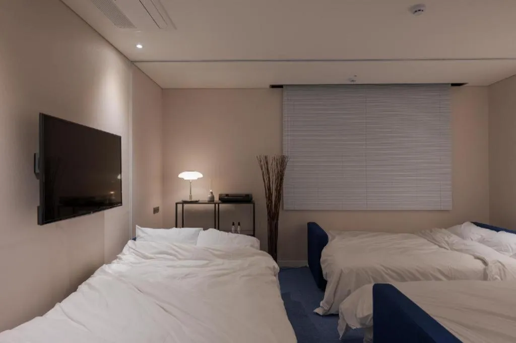 Bed in CS Premier Hotel