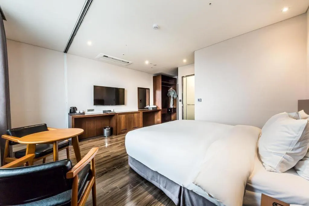 Bed in CS Premier Hotel