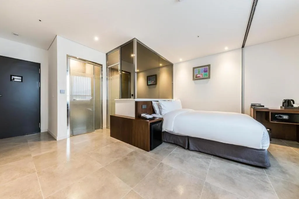 Bed in CS Premier Hotel