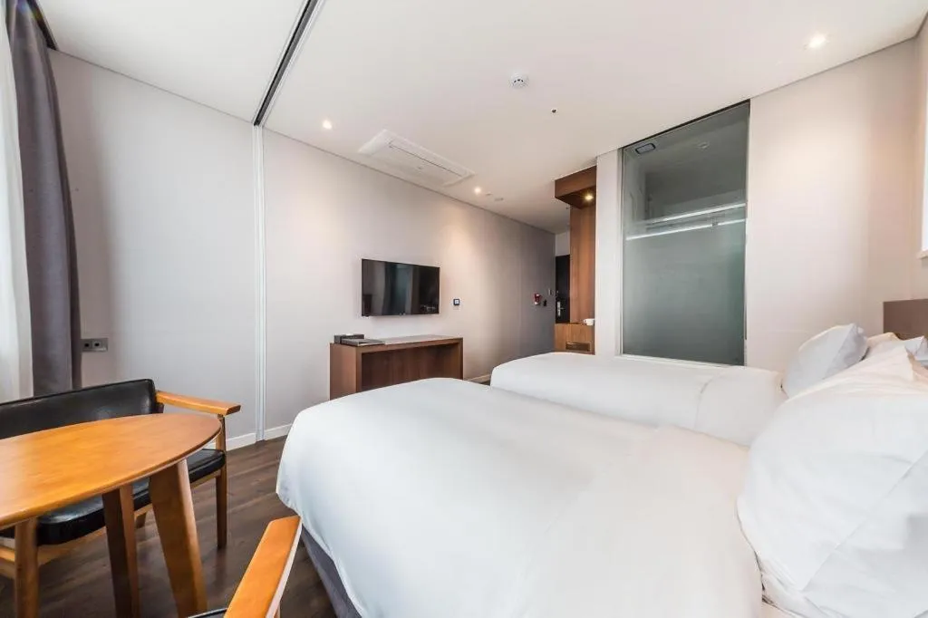 Bed in CS Premier Hotel