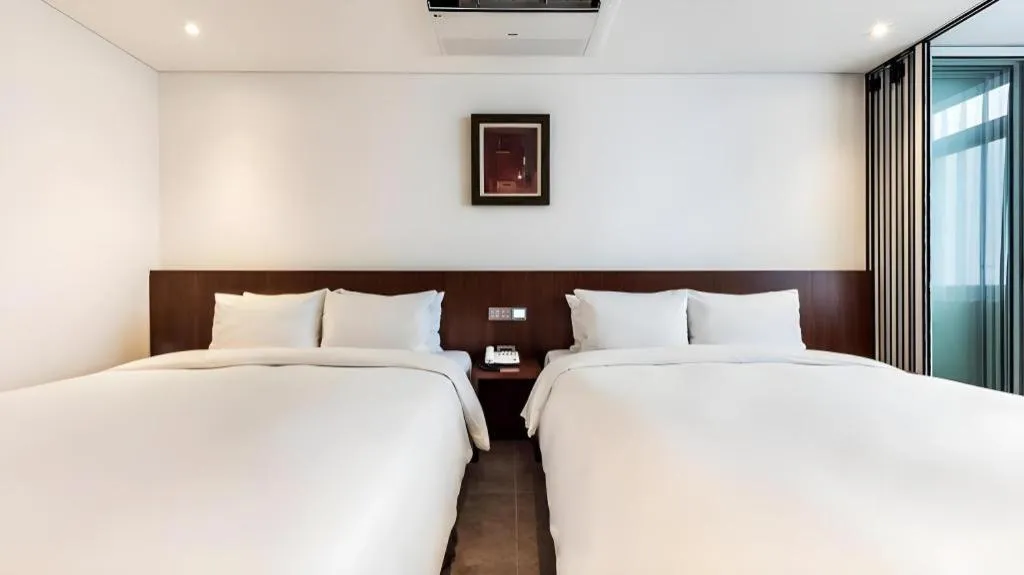 Bed in CS Premier Hotel