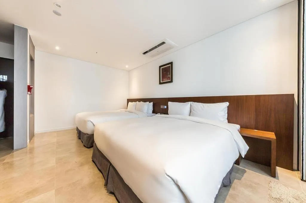 Bed in CS Premier Hotel